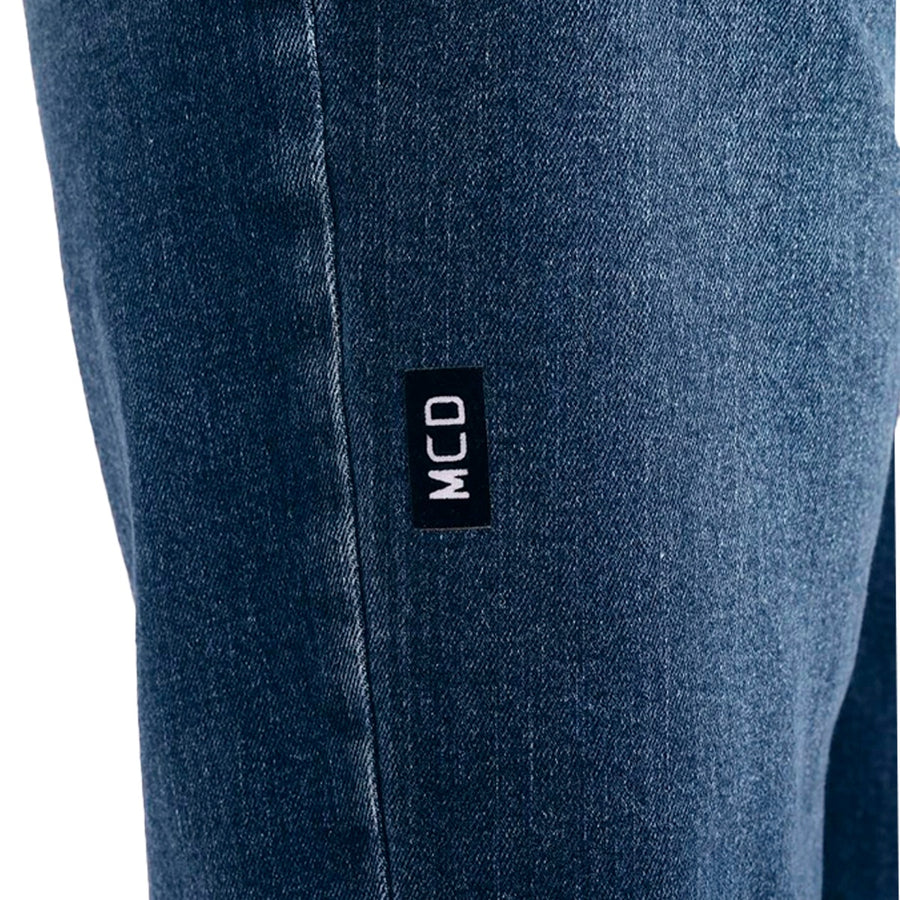 Calça Mcd Denim Masculino — Uma etiqueta na lateral da perna